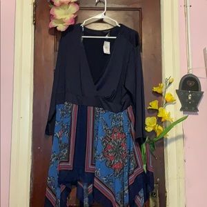 Navy blue/ multicolored shirt.